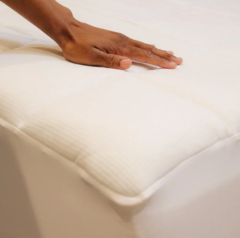 This Mattress Pad Uses NASA Technology to Help You Combat Night Sweats & Sleep Cooler